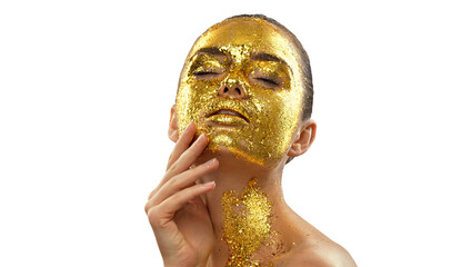 Fashion art Golden skin Woman face portrait closeup. Model girl with cracked gold foil on skin. Glamour shiny professional makeup. Jewellery, accessories. Beauty gold metallic body, Lips and Skin