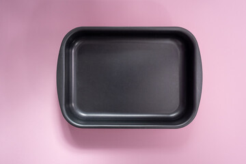Baking dish rectangular on pink background with shadow