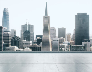 Empty concrete rooftop on the background of a beautiful San Francisco city skyline at daytime,...