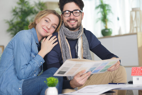 young couple designing a new home interior
