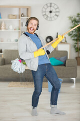 animated man using mop as an air guitar