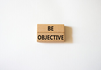 Be Objective symbol. Wooden blocks with words Be Objective. Beautiful white background. Business and Be Objective concept. Copy space.