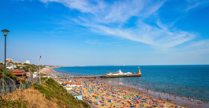 View of Bournemouth beach and Pier in Bournemouth Dorset UK during sunset