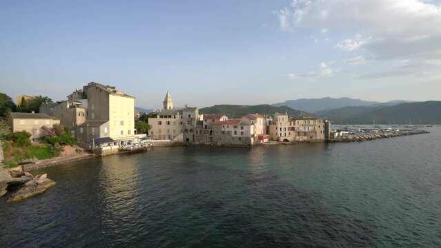 The scenographic village of Saint Florent (San Fiorenzo) on a summer afternoon, in Corse, France.