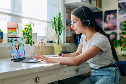 Video conference, teen girl student talking to teacher on screen