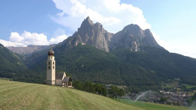 Beautiful view with the Church of San Valentino and the Sciliar Massif. Castelrotto, Bolzano, Trentino Alto Adige, Italy.