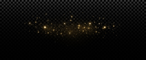 Golden glitter.Light effect.Glittering particles background. Gold dust on a transparent background.