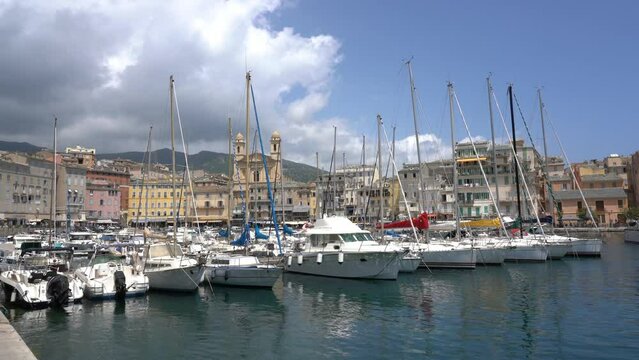 The colorful city of Bastia and its harbour on a sunny summer day. Corse, France.