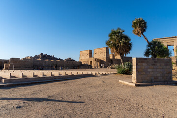 Philae Temple at sunset on a sunny day.