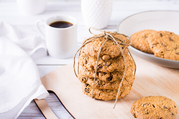 Oatmeal cookies with raisins on the board. Home made pastries.