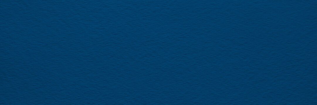 abstract dark blue wide panorama background on texture canvas or paper as blank, template, page or web banner