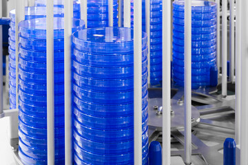 Analyst petri dish laboratory blue  background. Chemical biological medical and scientific analysis concept.