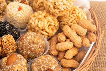 Gulab Gajak Mithai, Pista Gazak, Til Patti Or Papdi, Til Laddu Or Ladoo, Revdi And Rewri Made Of Tilgul, Mungfali, Sesame Seed, Jaggery Gud, Badam And Pista For Makar Sankranti Or Lohri Celebration