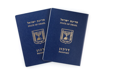 Two Israeli passports isolated on a white background. International Travel Identity Document. Close-up