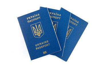Ukrainian biometric foreign passports, isolated on white background. Inscription in Ukrainian Ukraine Passport. Close-up.