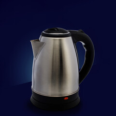 electric metal kettle on a blue background