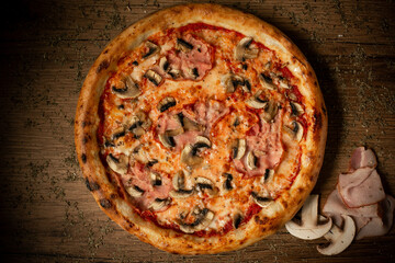 delicious pizza with bacon or ham and mushroom, top view