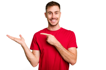 Young caucasian man cut out isolated excited holding a copy space on palm.