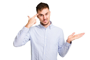 Naklejka premium Young caucasian man cut out isolated showing a disappointment gesture with forefinger.