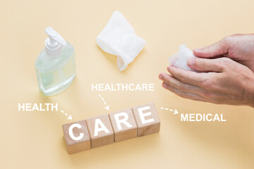 Doctor hand arranging wood block stacking with icon healthcare. Concept Business health and medical.