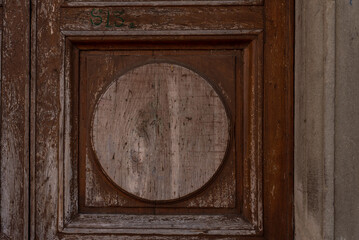 round wooden frame on the door, texture, close up, background