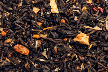 Mix tea with dried fruits. Close-up. Background, texture