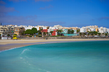 Residential buildings by the Atlantic Ocean in Puerto del Rosario, as seen from Playa Chica ("Chica Beach") in the capital of Fuerteventura island in the Canary Islands, Spain