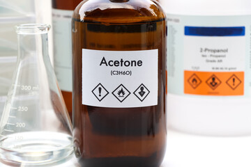 Acetone in bottle , chemical in the laboratory and industry