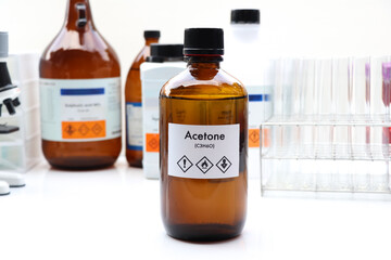 Acetone in bottle , chemical in the laboratory and industry