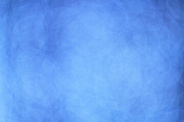Abstract foggy blue background with light haze.