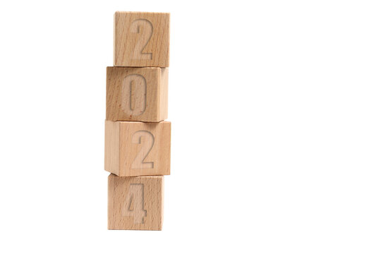 Wooden cubes with numbers 2024, white background.