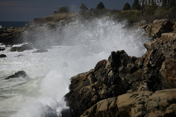 Ocean waves crashing against a rocky shore