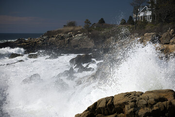 Ocean waves crashing against a rocky shore