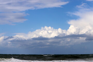 Obraz premium Rain clouds in the sky over the Mediterranean Sea in northern Israel.