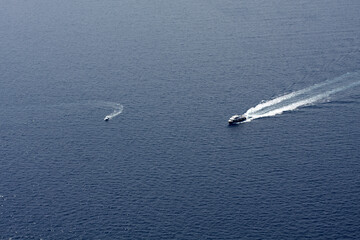 Big and small boats. Santorini. Greece. 2013