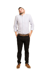 Full body adult latin man cut out isolated shrugs shoulders and open eyes confused.