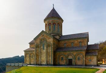 Fototapeta na wymiar Scenic spring view of Church of St. Nino in Bodbe nunnery, popular pilgrimage site among Orthodox Christians, Kakheti, Georgia