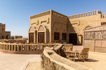 Abandoned mud brick hotel in Al Qasr village in Dakhla oasis, Egypt