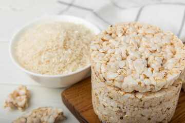 Rice cakes on a white texture background. Bread. Airy rice bread. dietary crispy round rice cakes. Place for text. Place to copy. Healthy food. dietary product.
