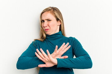 Young caucasian woman isolated on white background doing a denial gesture