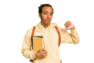 Young african american student man holding a book feels proud and self confident, example to follow.
