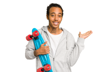 Young skater African American man isolated showing a copy space on a palm and holding another hand on waist.