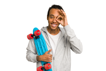 Young skater African American man isolated excited keeping ok gesture on eye.
