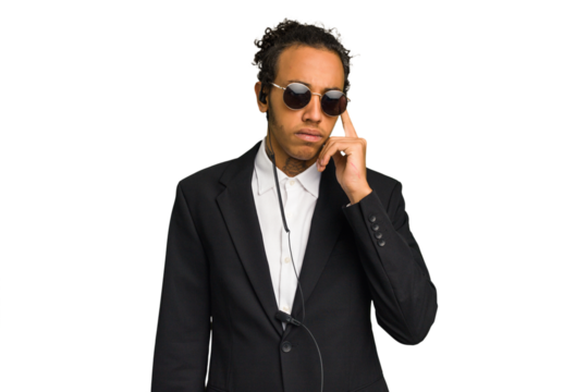 Young African American bodyguard man isolated pointing temple with finger, thinking, focused on a task.