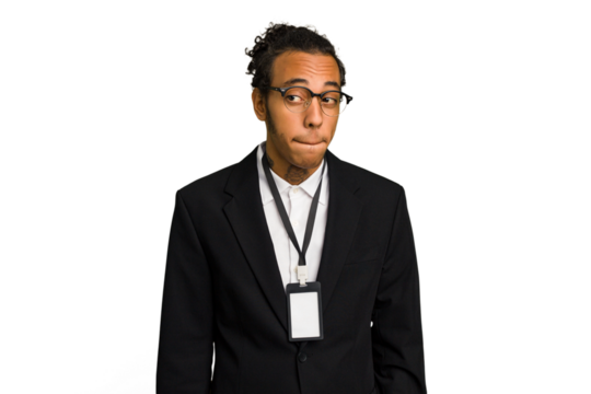 Young African American business man with badge isolated confused, feels doubtful and unsure.