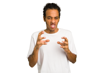 Young African American man isolated upset screaming with tense hands.