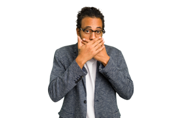 Young African American man isolated covering mouth with hands looking worried.