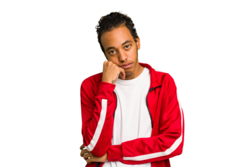 Young African American man isolated tired of a repetitive task.