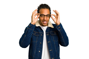 Young African American man isolated excited keeping ok gesture on eye.