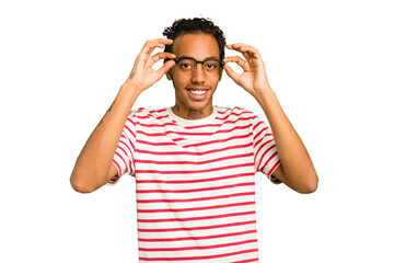Fototapeta premium Young African American man isolated showing okay sign over eyes